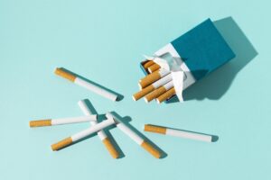 pack-cigarettes-blue-background